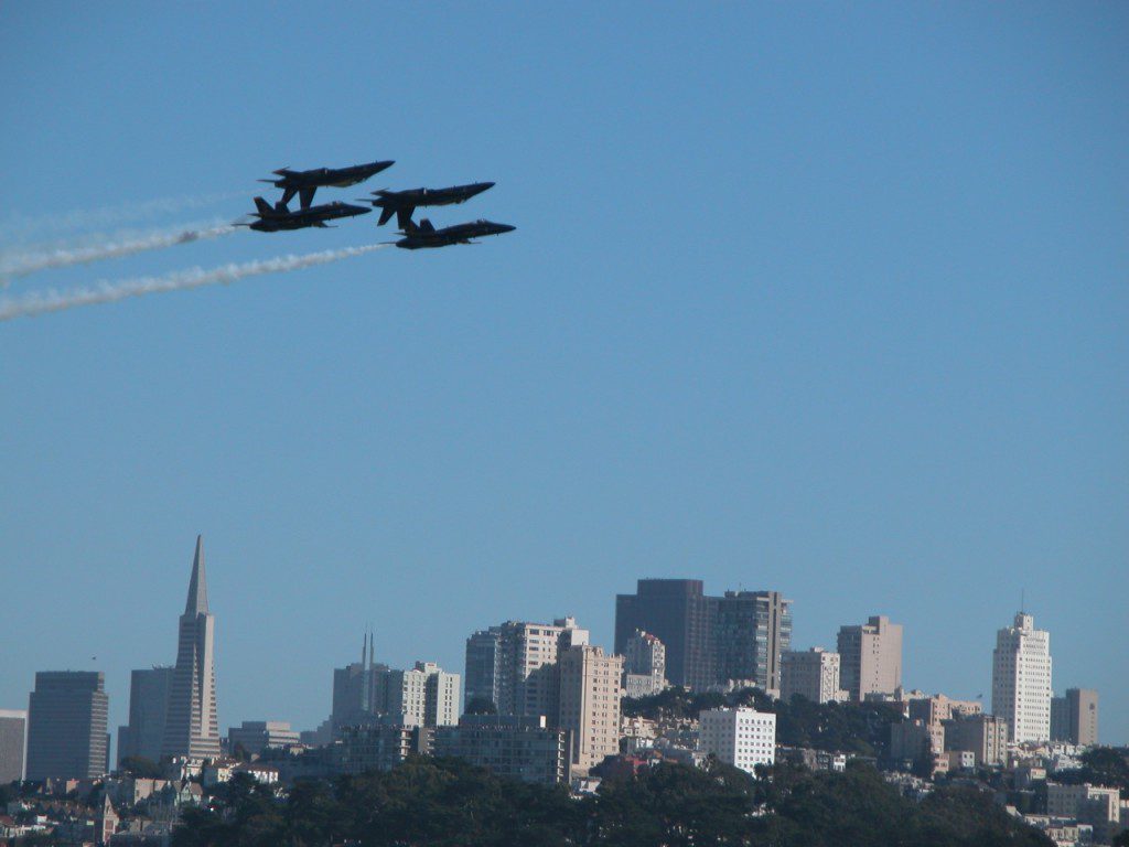 Blue Angels flying over San Francisco skyline during Fleet Week SF – © LoveToEatAndTravel.com
