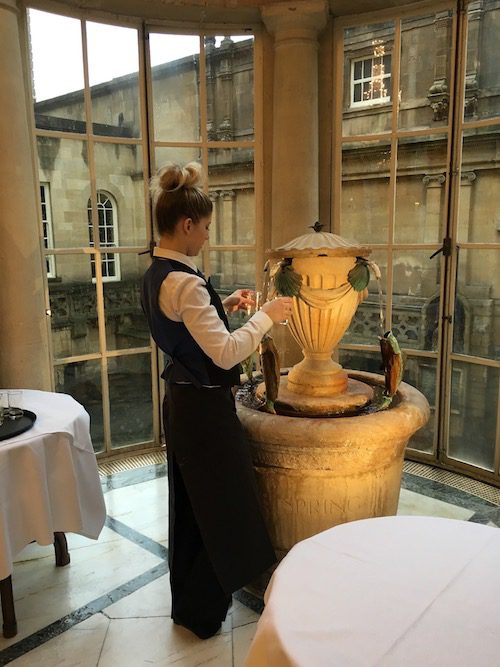 Bath Spa Water at the fountain in the Pump Room at the Roman Baths, Bath, UK - photo © Love to Eat and Travel