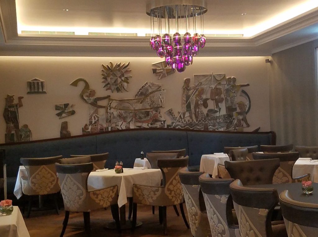 Lausanne La Brasserie du Roy dining room with Greek motif evoking the Olympic influence in Lausanne - Credit: Deborah Grossman