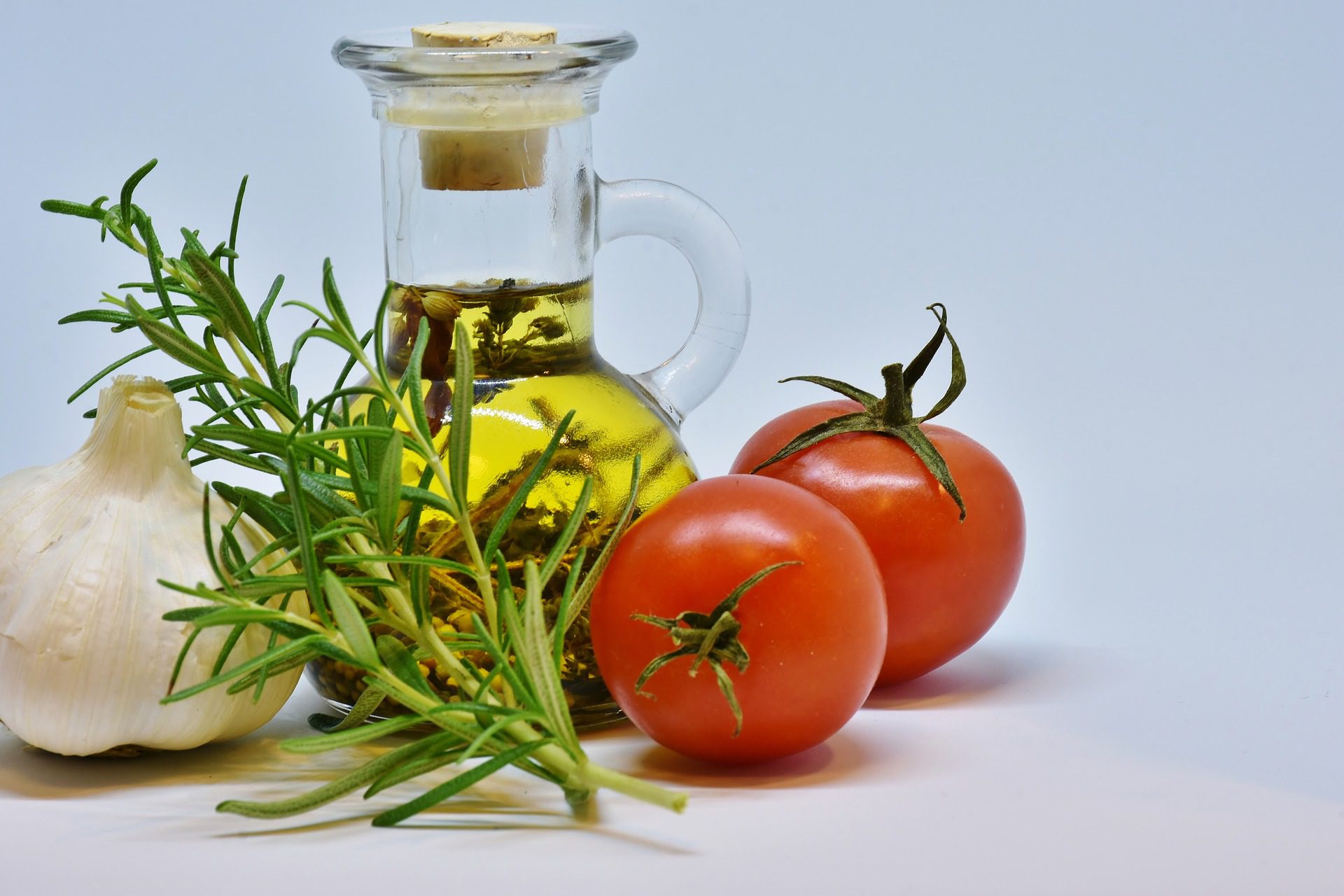 Olive oil, tomatoes and fresh herbs