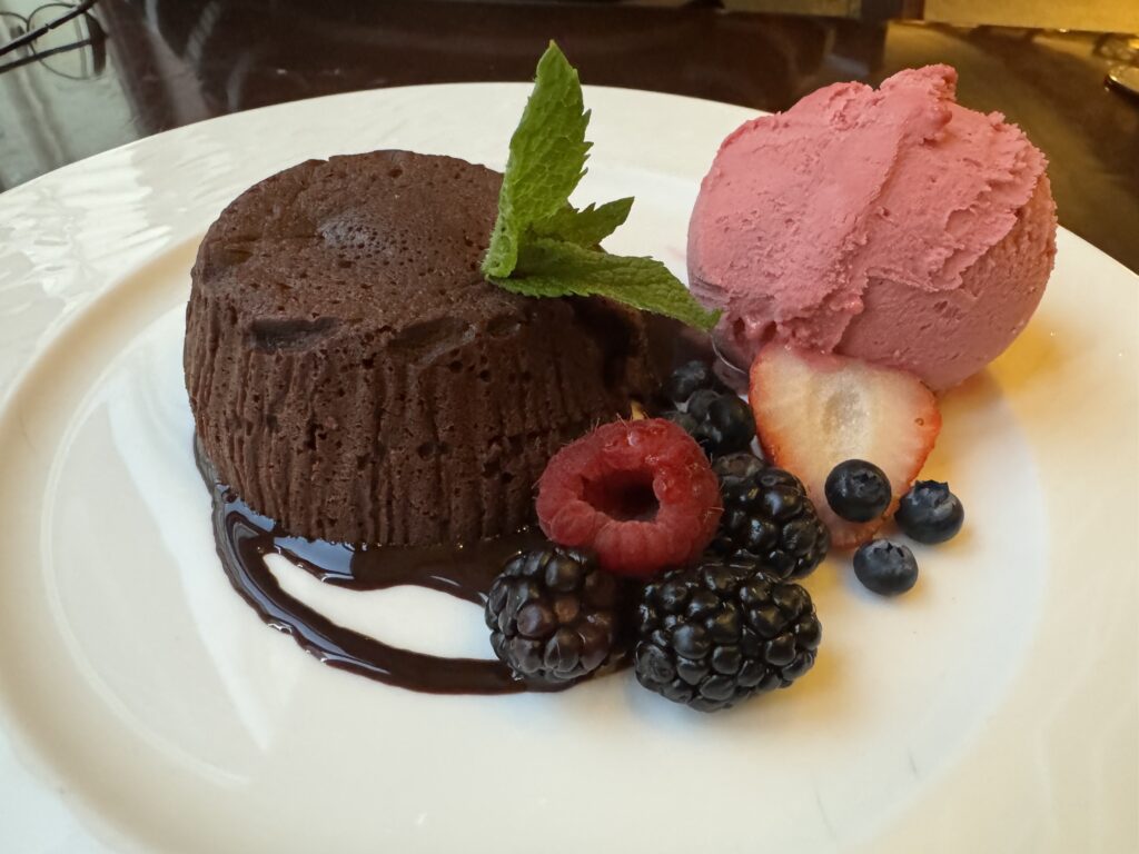 Chocolate Lava Cake with Strawberry Sorbetto dessert at Nob Hill Club at InterContinental Mark Hopkins San Francisco - © lovetoeatandtravel.com